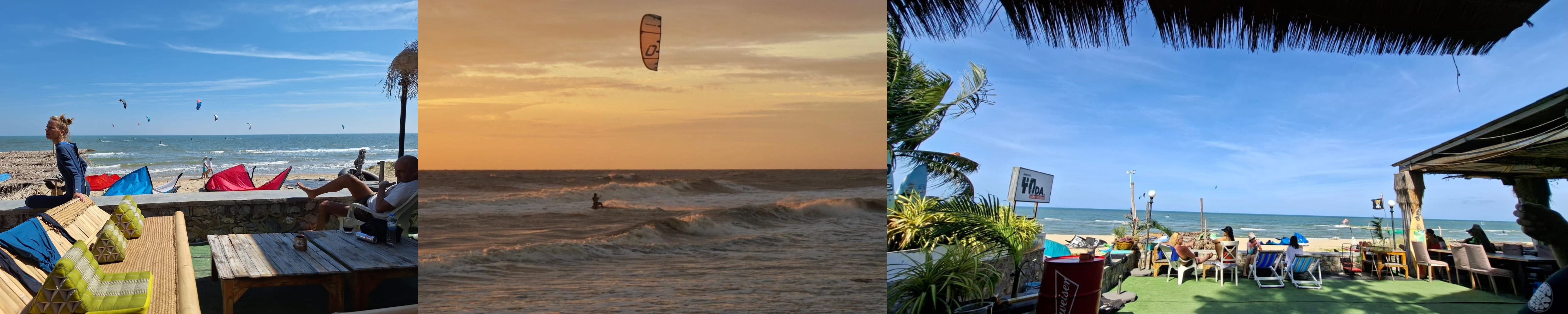 Kitesurfers riding steady winds along the wide sandy beach at Yoda Kite School in Pak Nam Pran, Pranburi, Thailand, with bright kites in the sky.