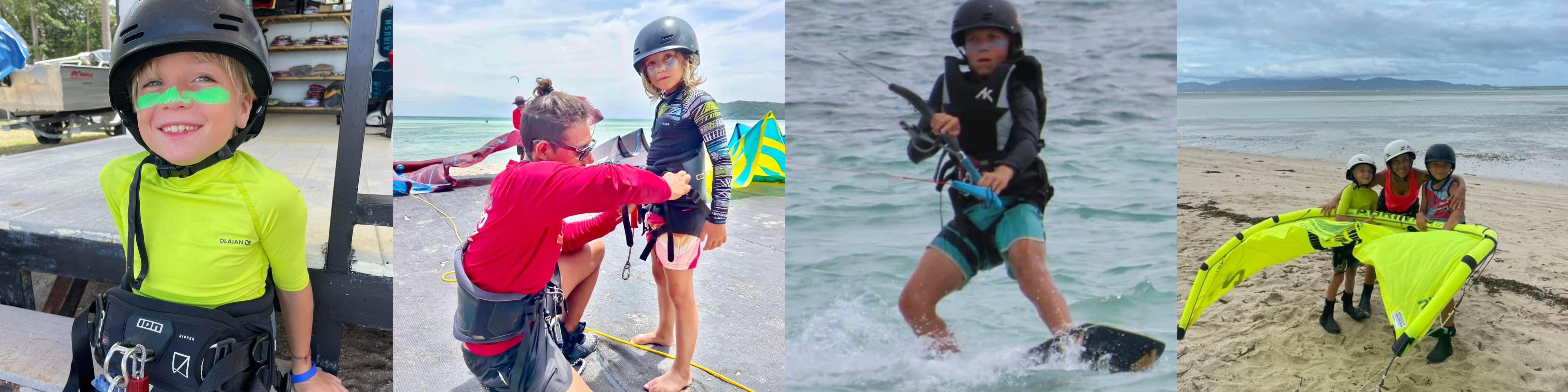 Young children learning kitesurfing in Koh Phangan, Thailand, wearing kitesurf gear and holding small kites on a tropical beach.